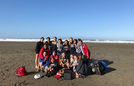 Soccer team on beach. 
