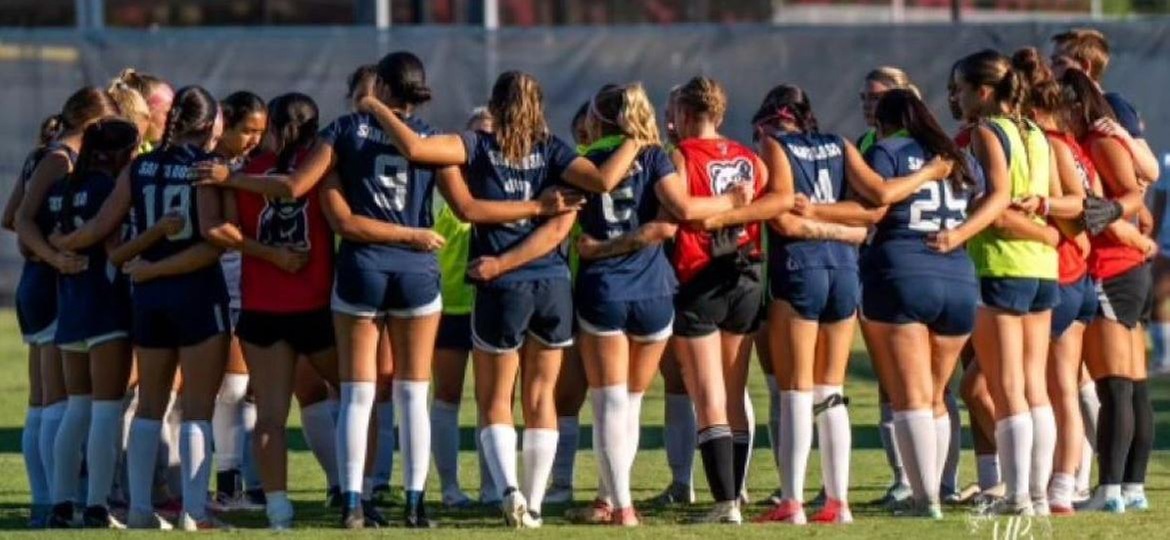 Team huddled up for a pregame meeting