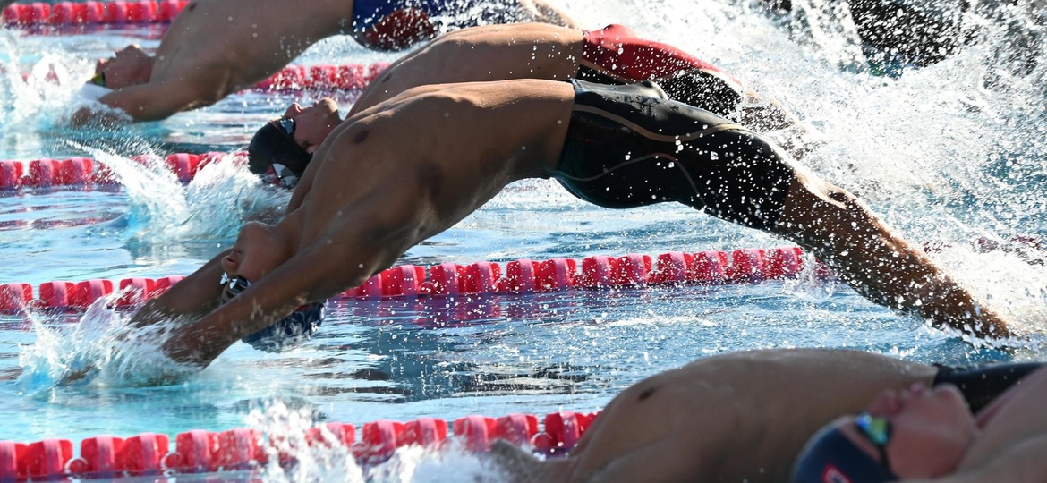 Andrew Morris starts his winning 200 Back at the conference finals. Photo: Mindy Breslin