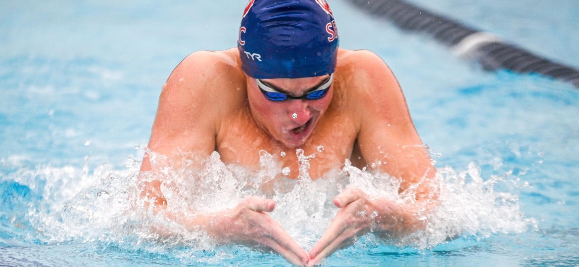 Freshman Phoenix Holt swims the breaststroke leg at the NorCal Relays meet. Photo: Mindy Breslin