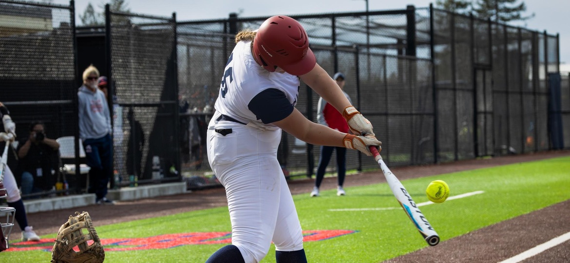 Alexis Hoke swings and puts the ball in play.